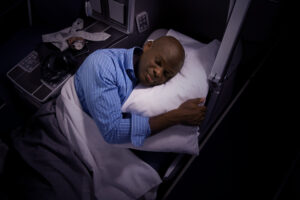 brussels airlines business sleeping man